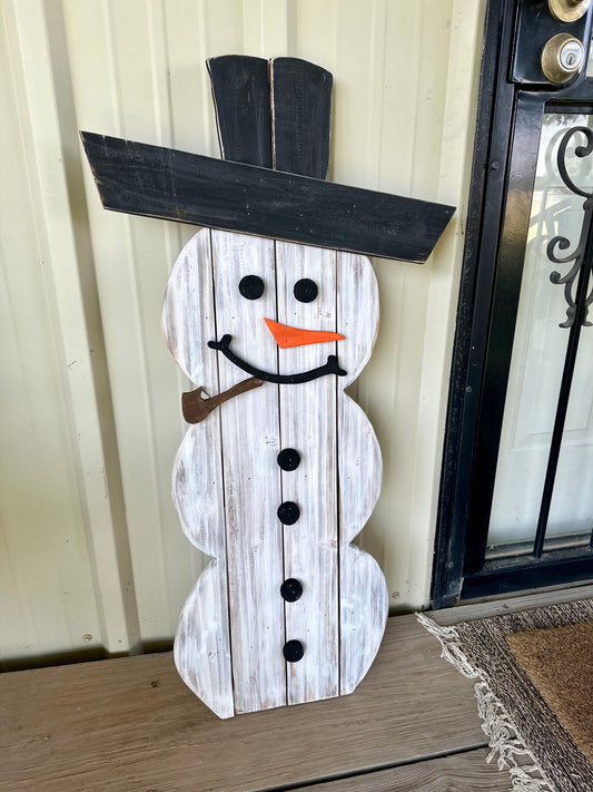 Leaning Snowman